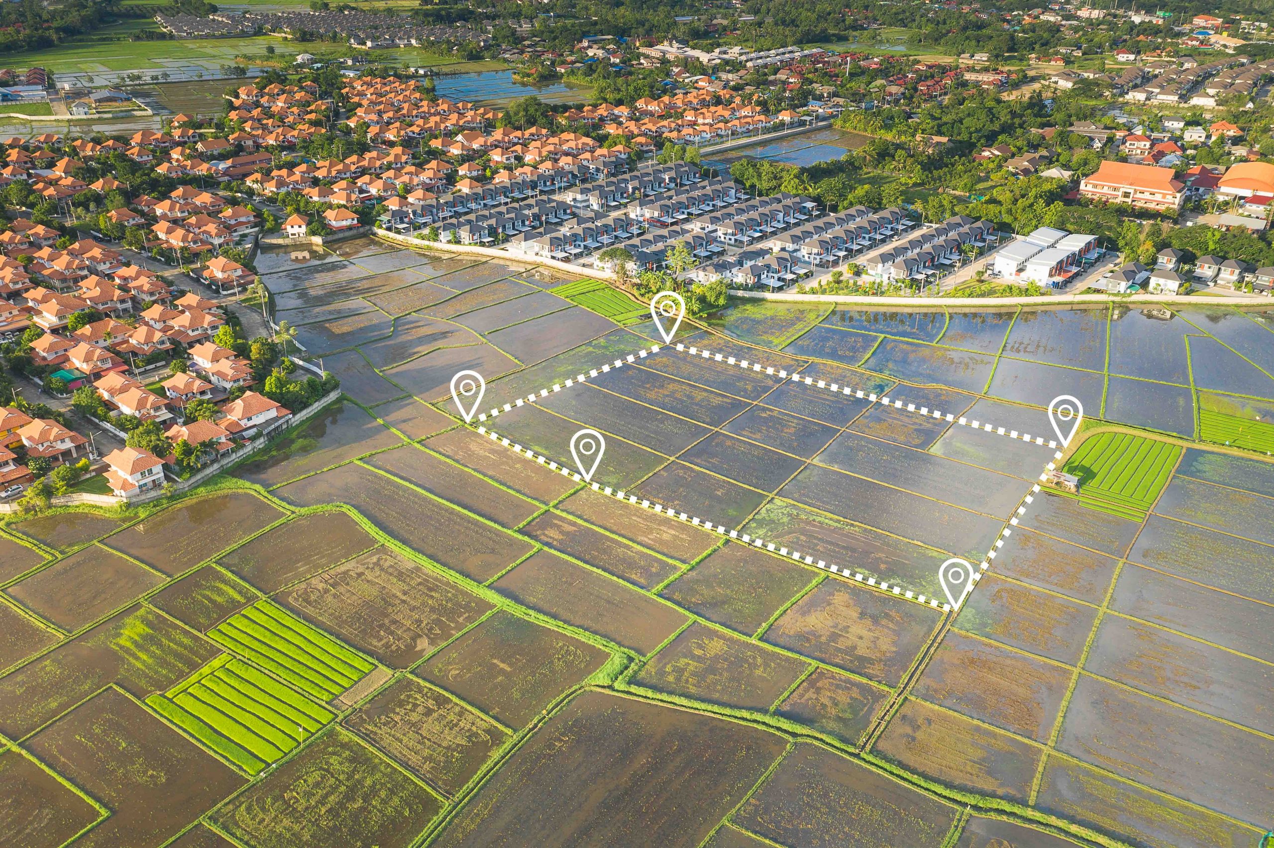 Aerial view of land plots and agricultural landscape
